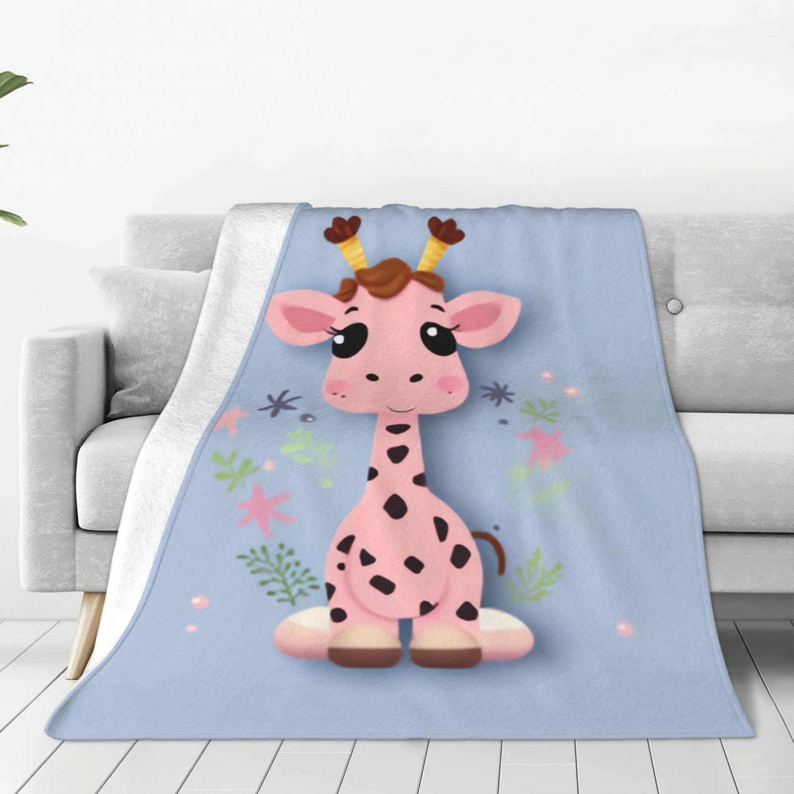 Couverture en micro polaire motif girafe rose, le cadeau idéal pour le canapé