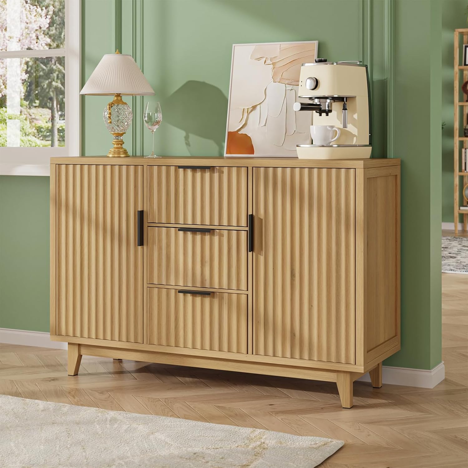 A FiveWillowise storage cabinet used as a coffee bar in a kitchen or living area, with a coffee machine and decorative items on top.