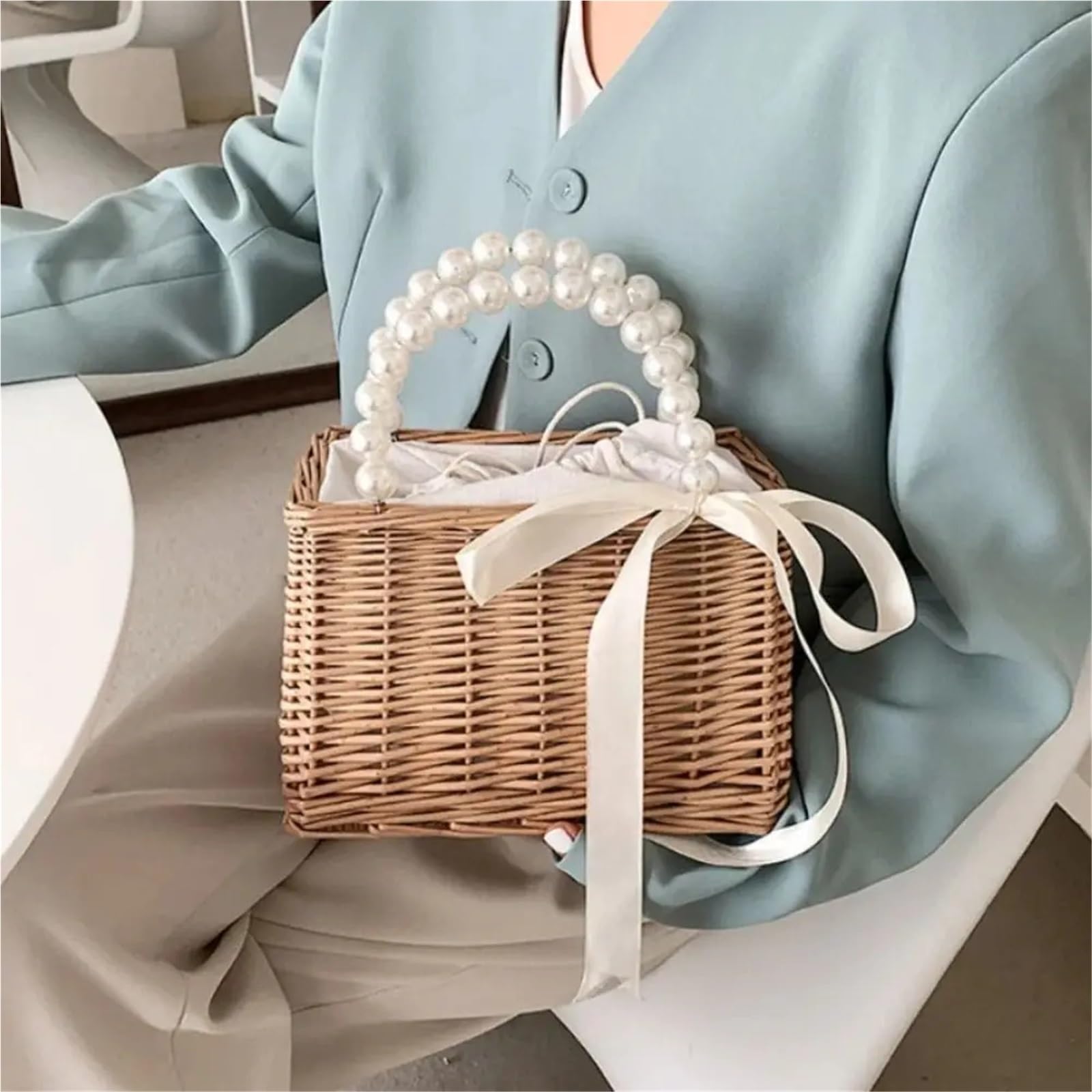 Bolsos de mano de paja con mango de perlas de verano