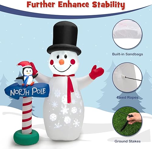 Miniatura 7 de Tangkula Muñeco de nieve inflable de Navidad de 6 pies, decoración de Navidad inflable con poste guía de pingüino, letrero de poste norte, muñeco de