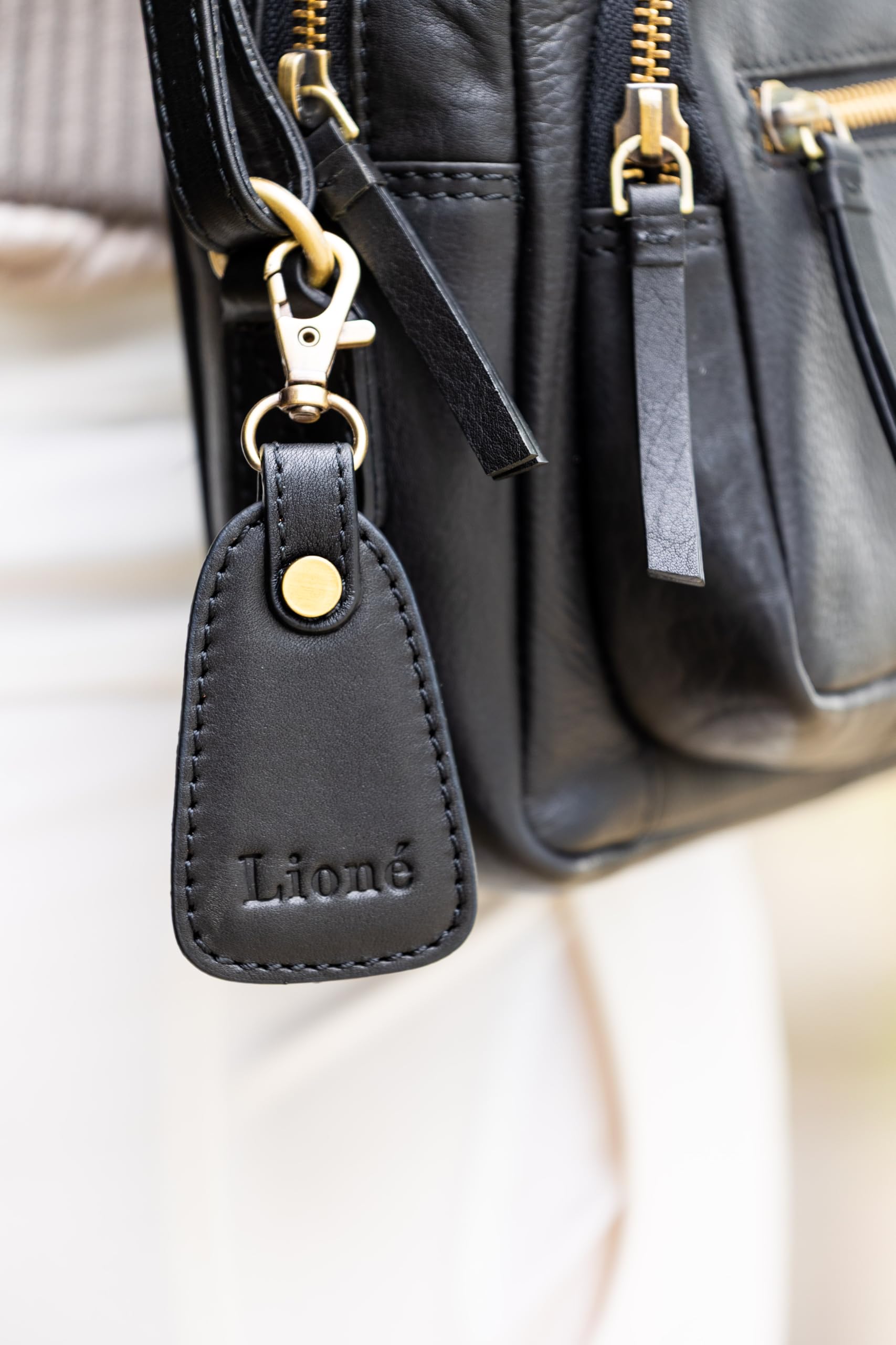 Bolso bandolera de piel auténtica con varios compartimentos con cremallera, compacto y claro