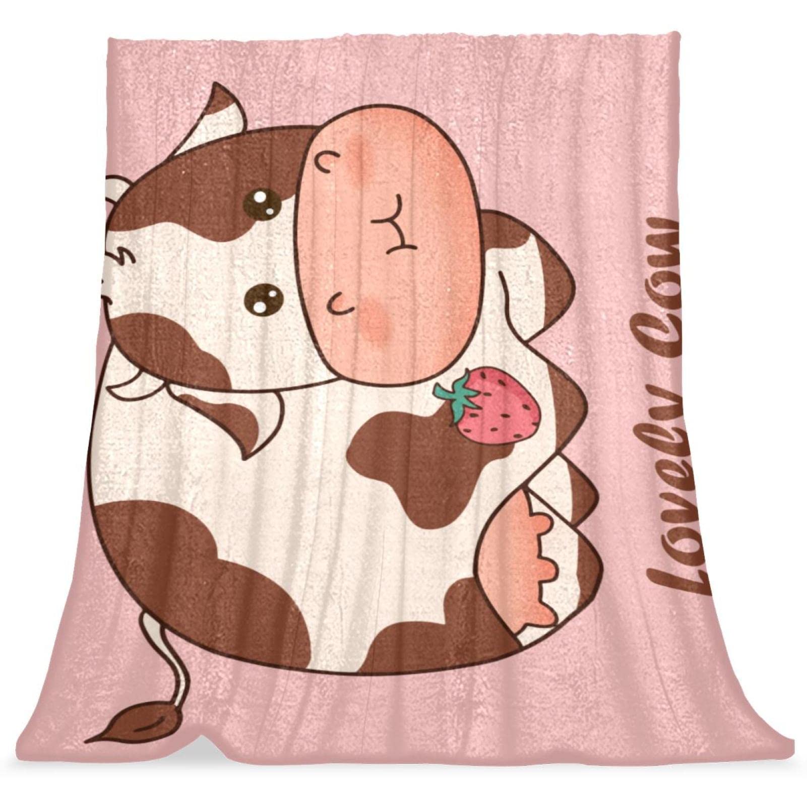 Couverture de lit vache rose pour moments cocooning dans la chambre enfant