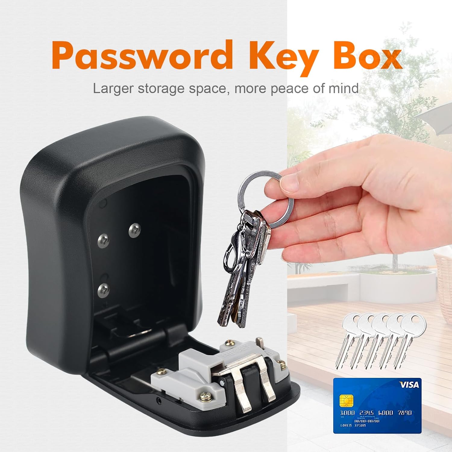 Hand placing keys and a credit card into the open Ibergrif MA201 key box, demonstrating its storage capacity.