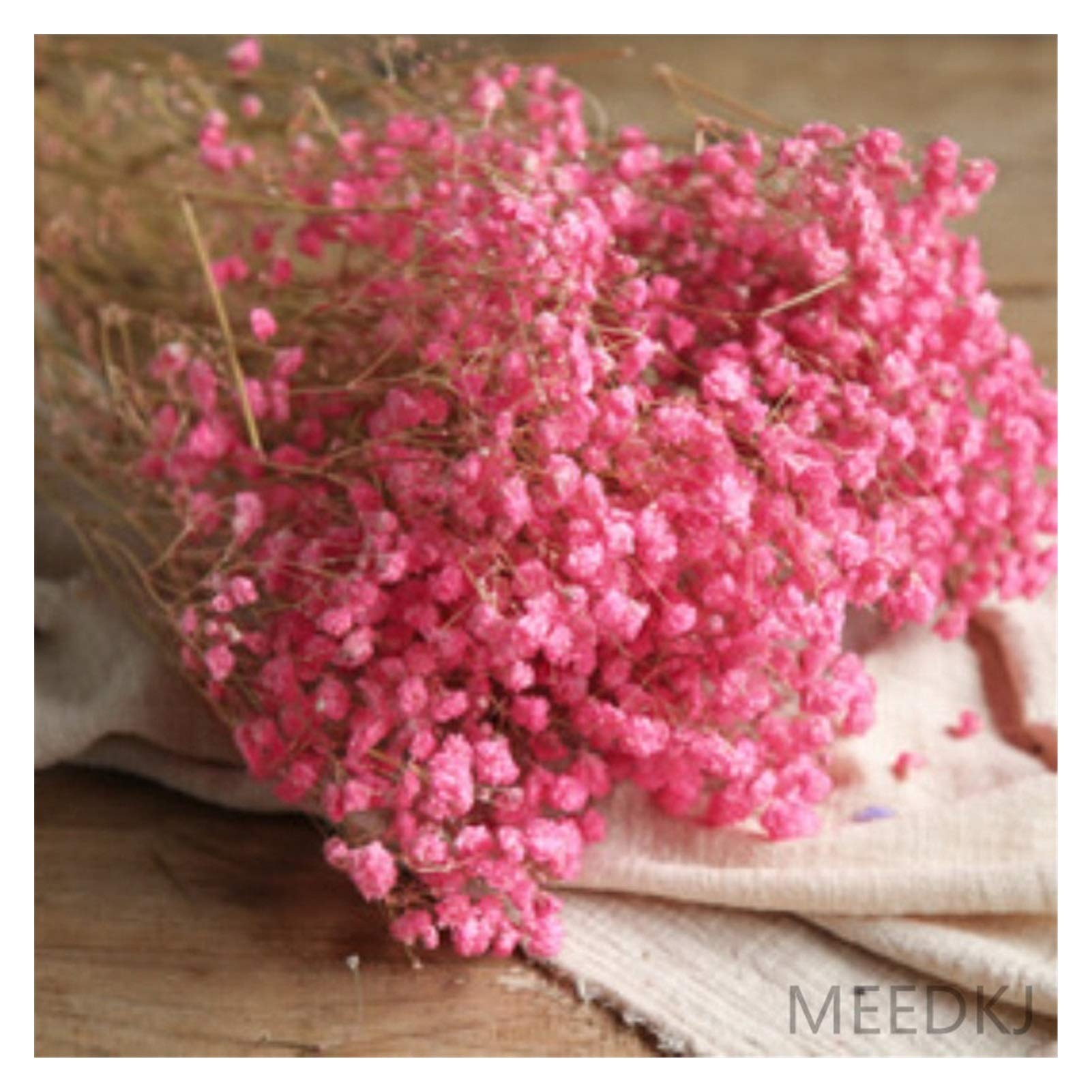 Fleurs séchées colorées pour une décoration de table et accessoires de tir
