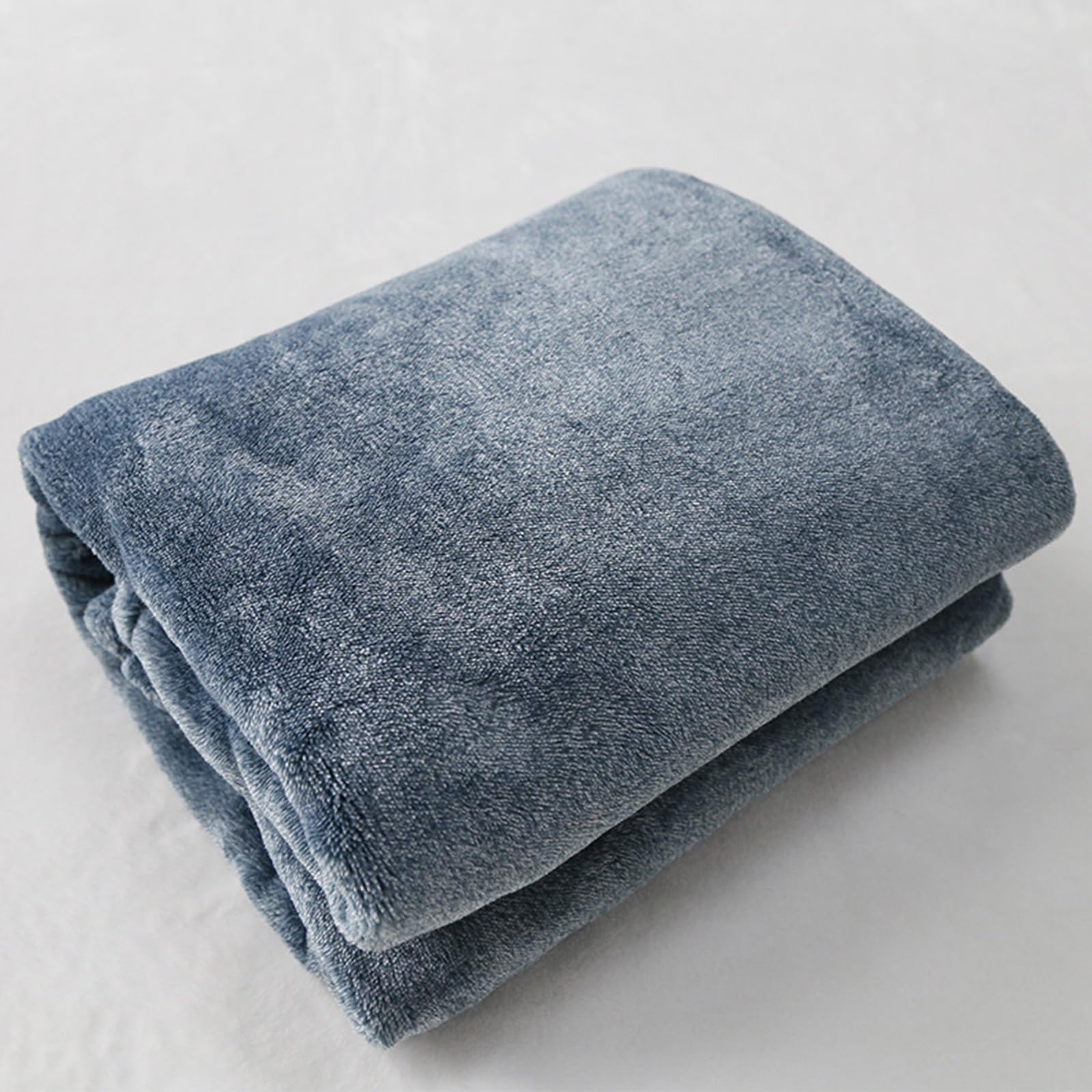 Couverture légère et ultra douce bleue pour canapé de salon