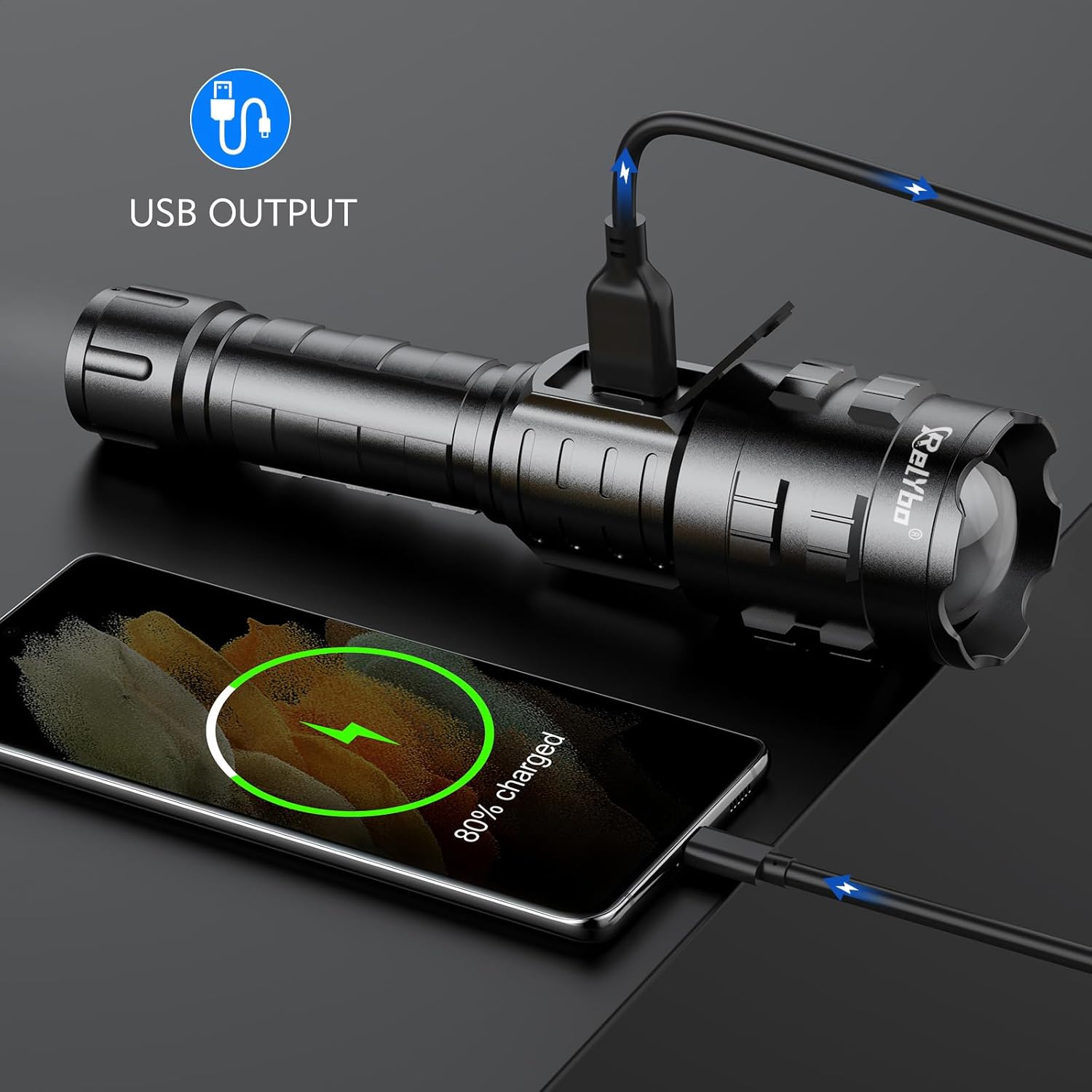 Relybo A06 LED Flashlight charging a smartphone via its USB output