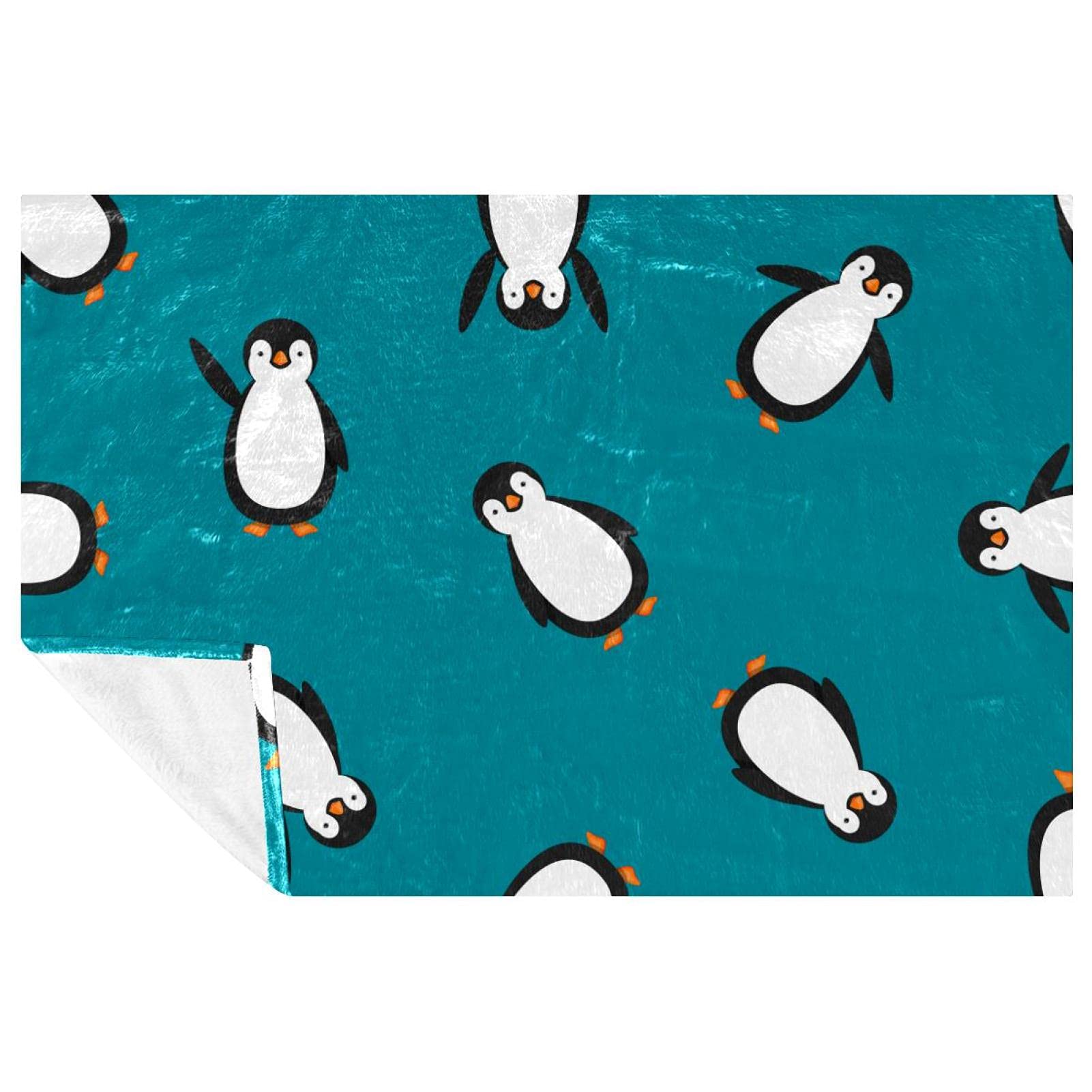 Couverture pingouin douce pour vos pique-niques et soirées canapé