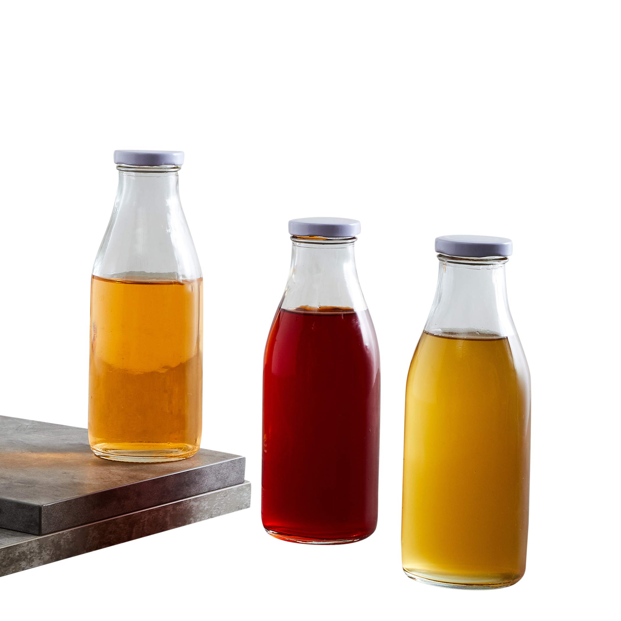 Home Centre Spinel-Osiris Solid Transparent Glass Bottles - Set of 3