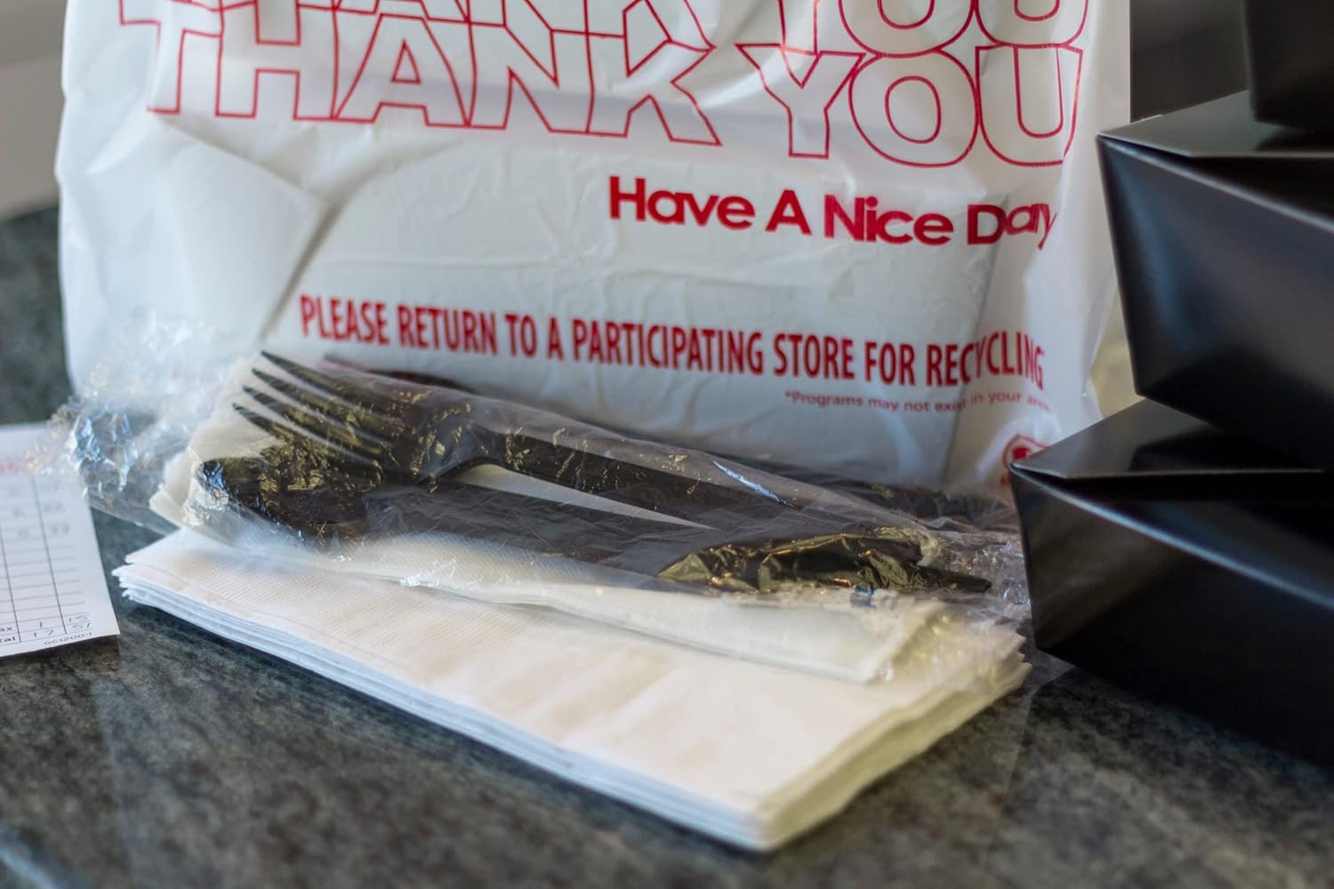 AmerCareRoyal 6-in-1 Disposable Silverware Medium Heavy Weight Plastic Utensil Set with Teaspoon, Fork, Knife, Salt & Pepper, 12x13 Napkin - Individually Wrapped Cutlery Meal Kit, Black, Case of 250