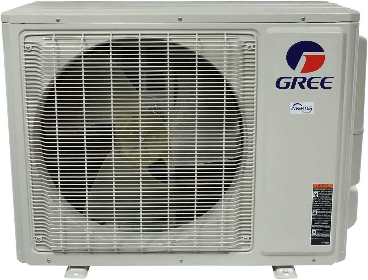 Primer pla view of the Gree outdoor condenser unit with the GREE logo and 'INVERTER' label visible.