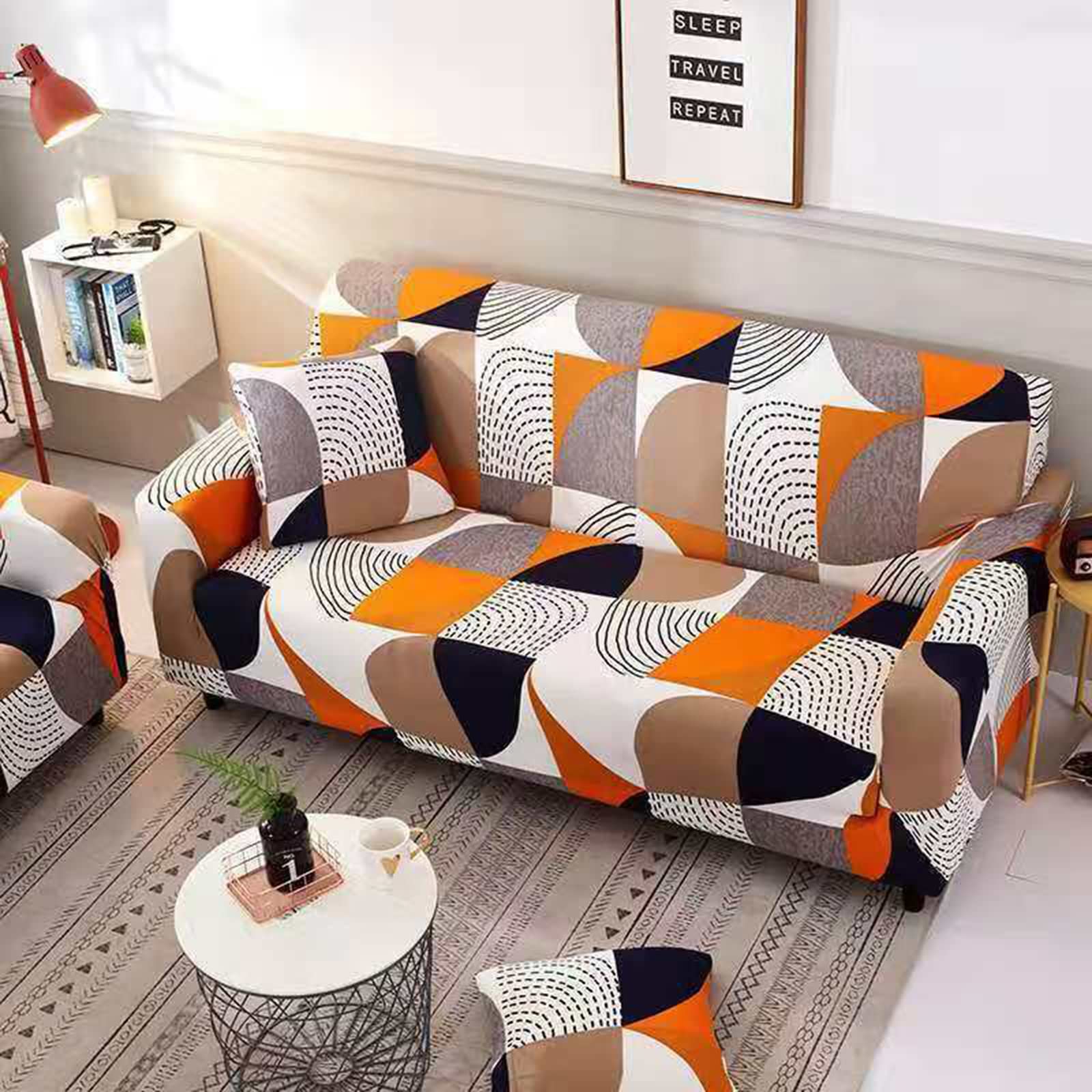Housse de canapé extensible pour rénover un fauteuil usé facilement
