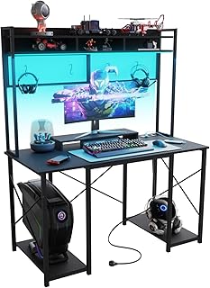 TRIUMPHKEY Escritorio Gaming con LED, 120x60cm Escritorio de Ordenador con Soporte y Estante de Almacenamiento, Mesa de Juego Ergonómico con Enchufe y 2 Tomas USB para Salas de Juego y Oficina Negro