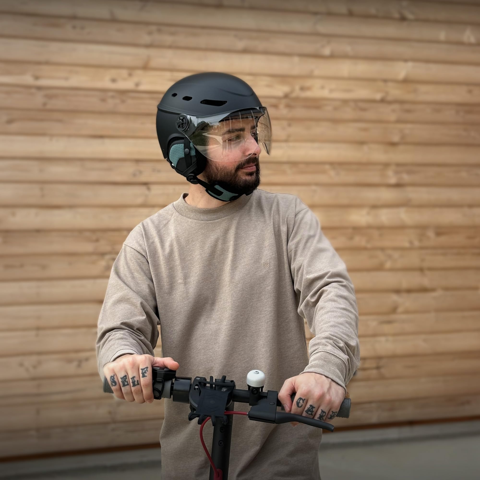 T'nB - Visor, Schutzhelm für Fahrrad und Elektroroller, mit transparentem Visier, Belüftungen, Einstellrad, abnehmbare Ohrenschützer, Größe M (Kopfumfang 54-58 cm), Schwarz