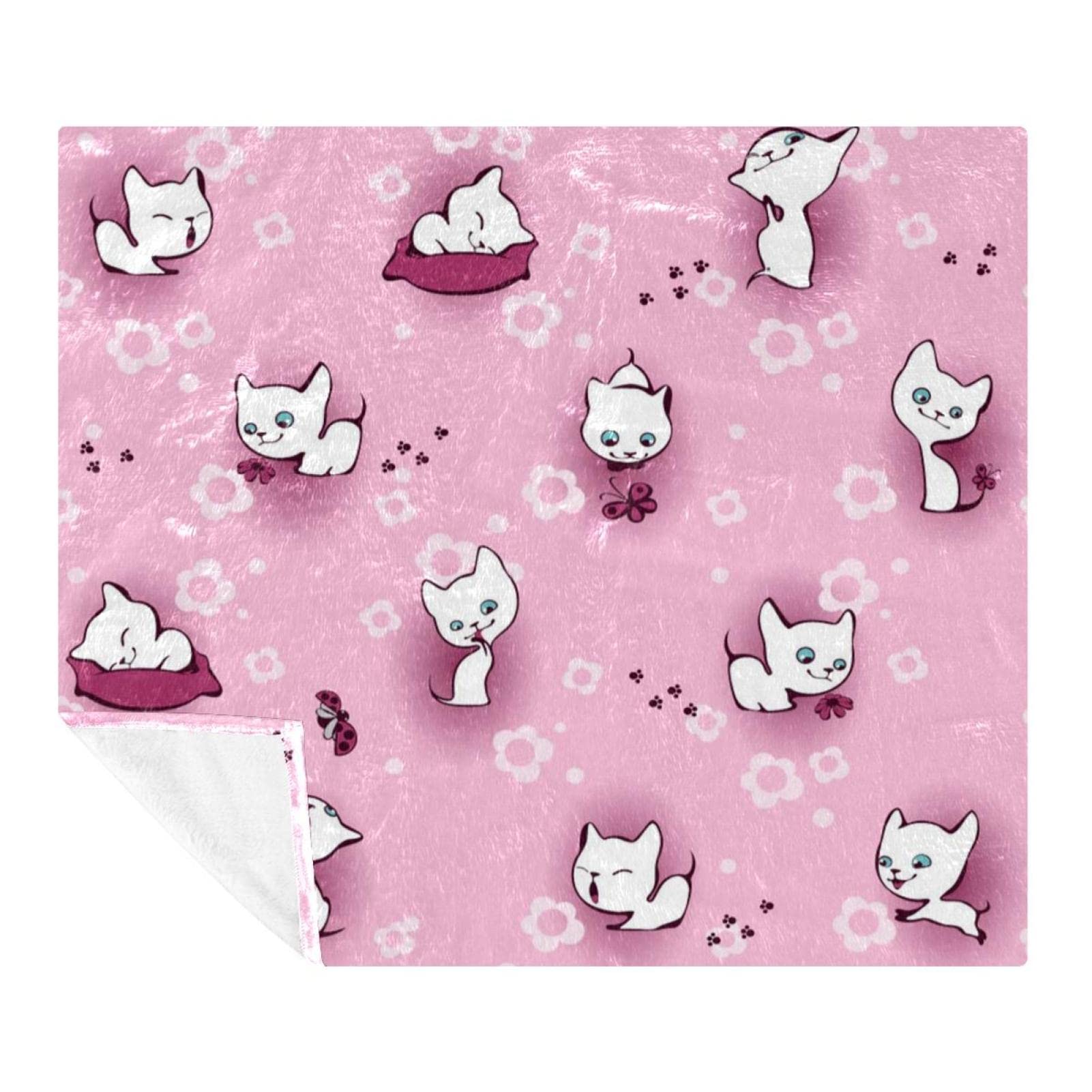 Couverture plaid chaton blanc douce pour des soirées cocooning sur le canapé