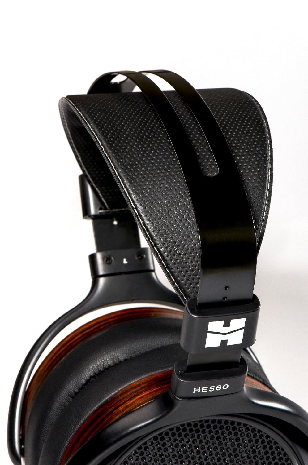 HIFIMAN HE560 headphones worn on a head, showing over-ear fit