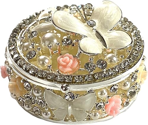 Joyero redondo de plata con flores decorativas y mariposas, color marfil
