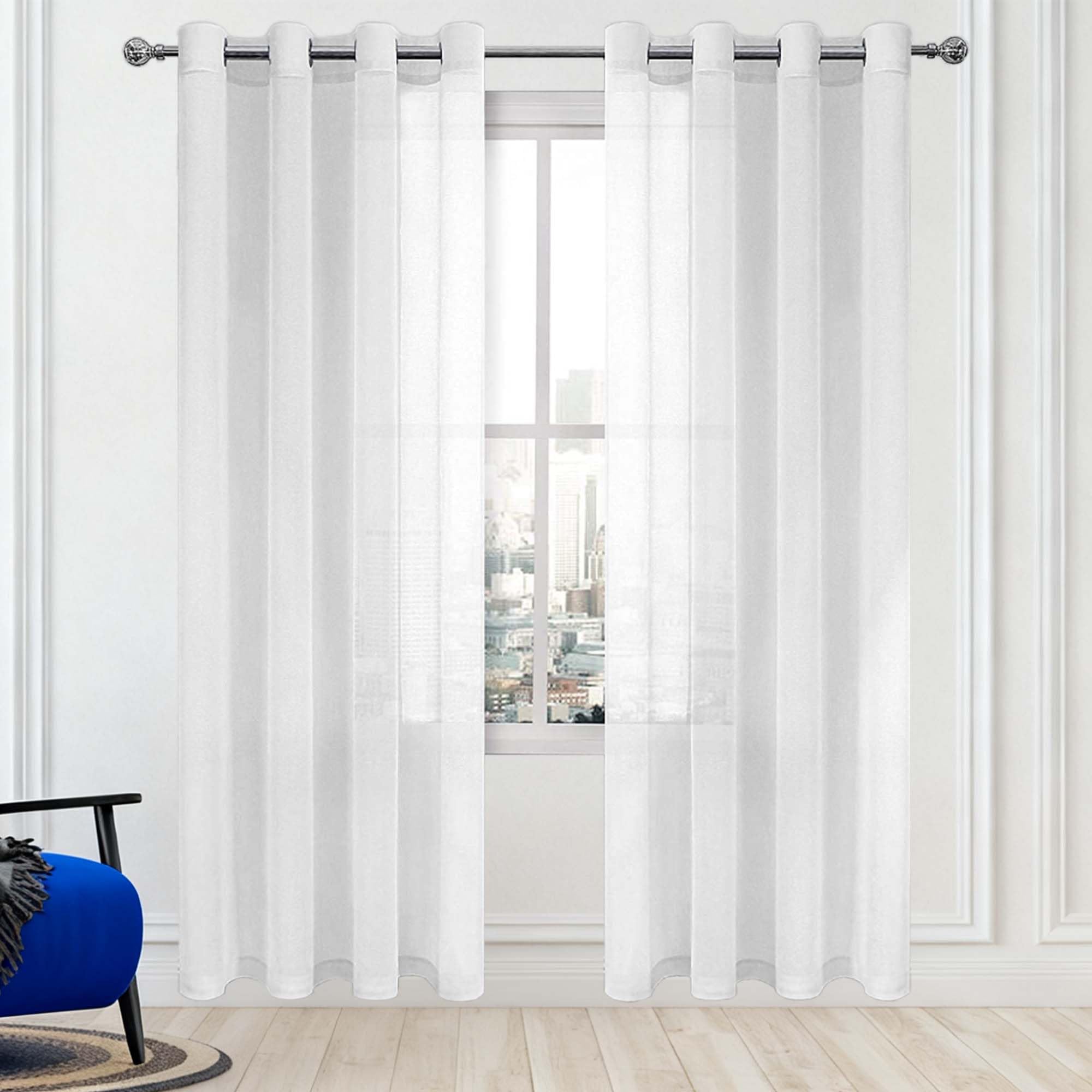 Rideau voilage transparent à oeillets blancs idéal pour illuminer le salon ou une chambre d'enfant