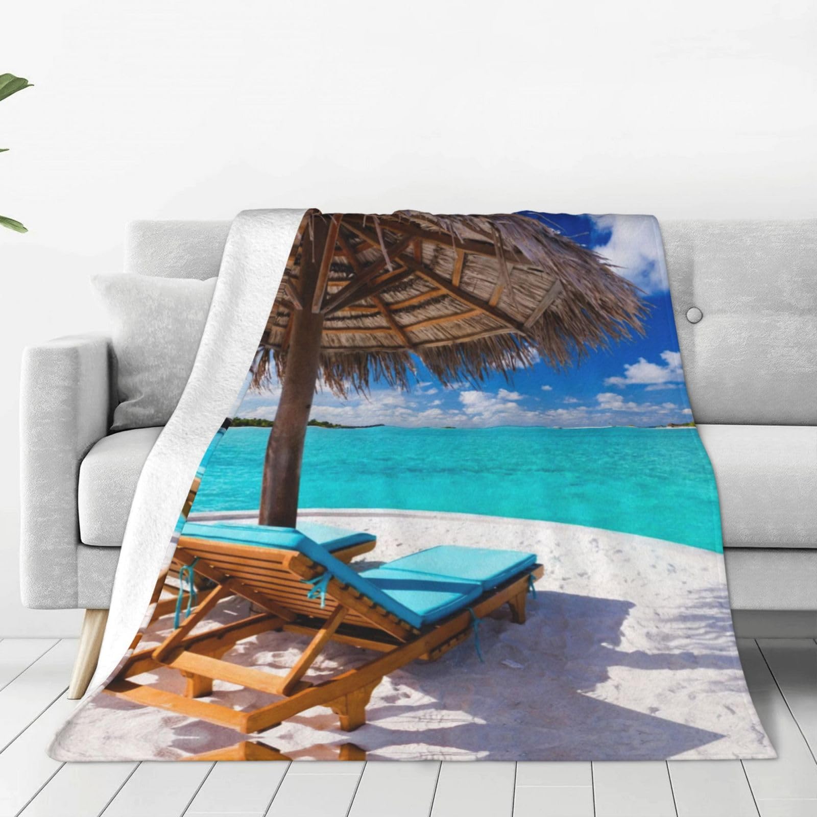 Couverture polaire plage tropicale pour vos soirées cocooning sur le canapé
