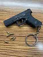 ミニチュアガン　モデルガン　キーホルダー　全長約4cm Affordable and authentic! The Mini Gun Keychain is so cool
