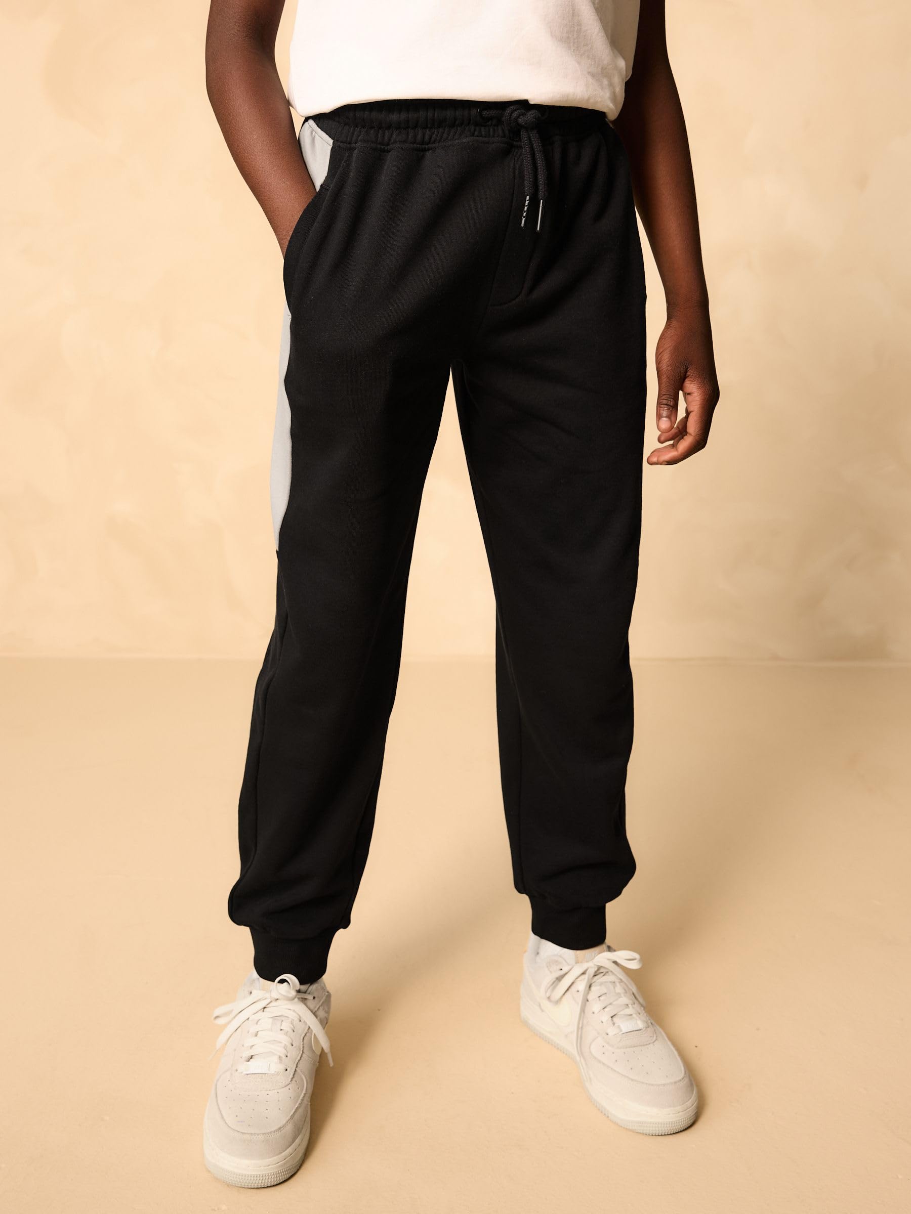 NEXT Niños Conjunto de sudadera con cremallera y cuello alzado y pantalones de chándal