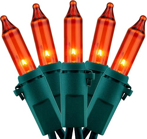 Luces de Navidad incandescentes en tira con cable en verde.