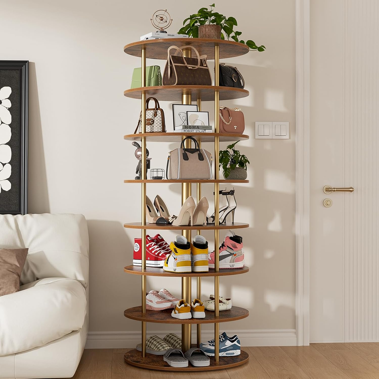 The 7-Tier Rotating Shoe Rack Tower placed in a living room next to a sofa, showcasing its stylish appearance and versatility for storing various items.