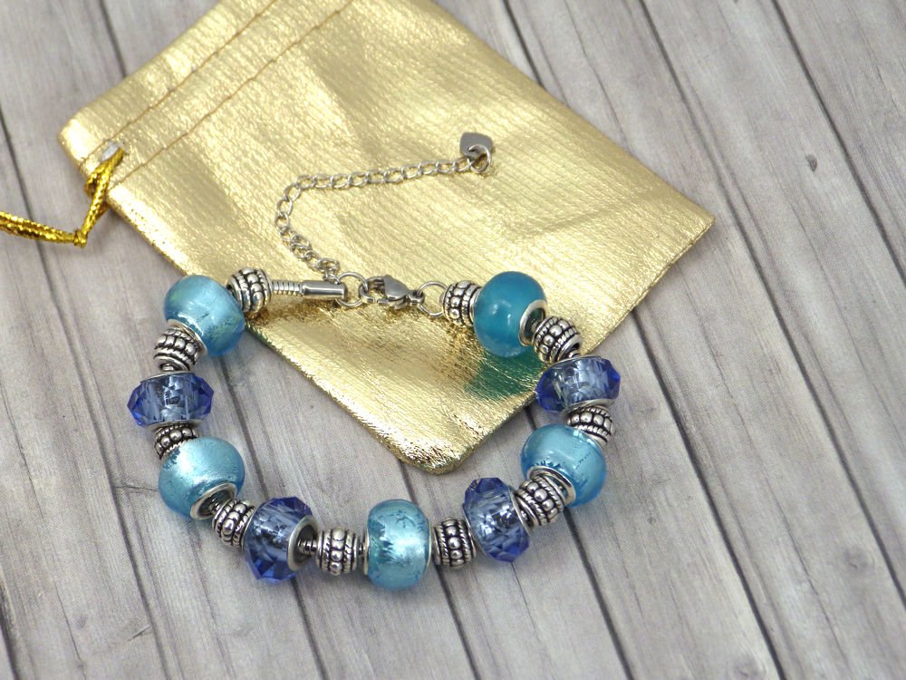Pulsera Thurcolas Charms para mujer modelo Manhattan acero inoxidable con cuentas de vidrio azul
