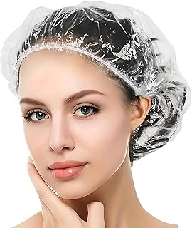 قبعات حمام للاستخدام مرة واحدة - قبعات استحمام بلاستيكية متعددة الاغراض مقاومة للماء مع مطاط للاستخدام في الصالونات والمنزل والسفر، 100 قطعة