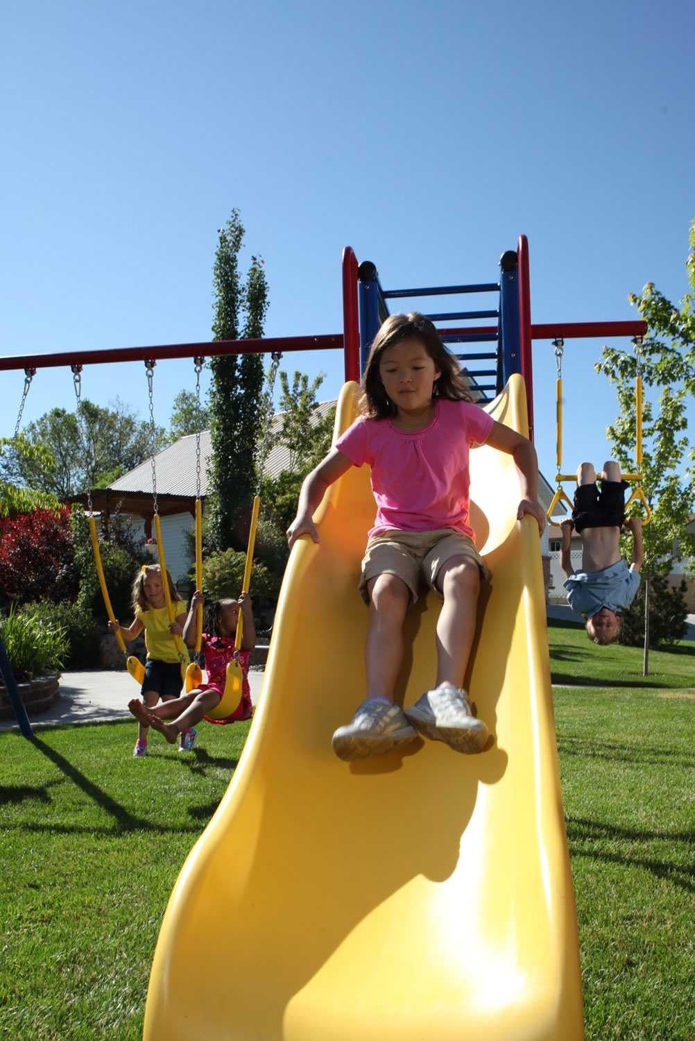 Lifetime Monkey Bar Adventure Swing Set with 9 Foot Wavy Slide