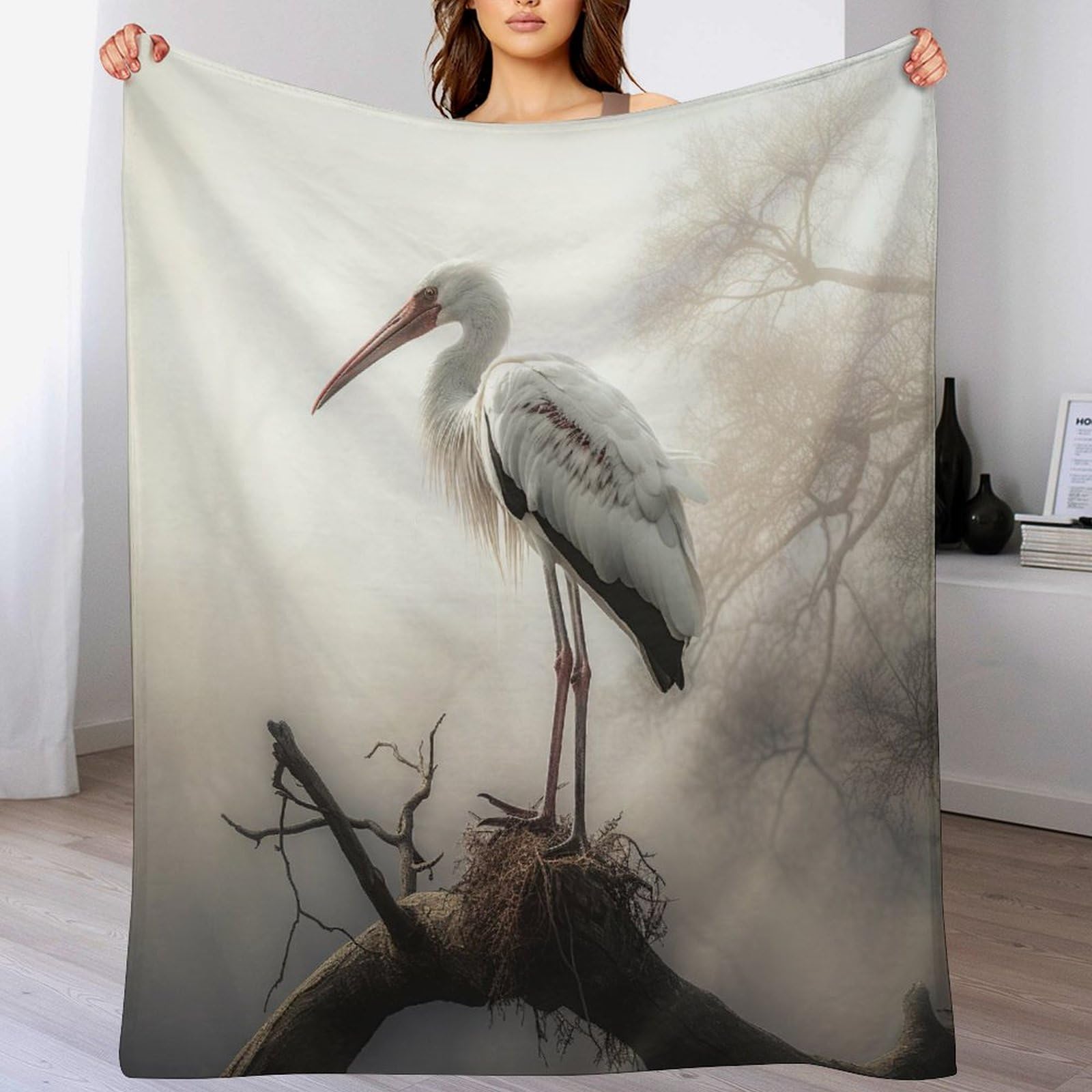 Couverture grue en polaire pour réchauffer vos soirées cocooning sur le canapé 100x130cm