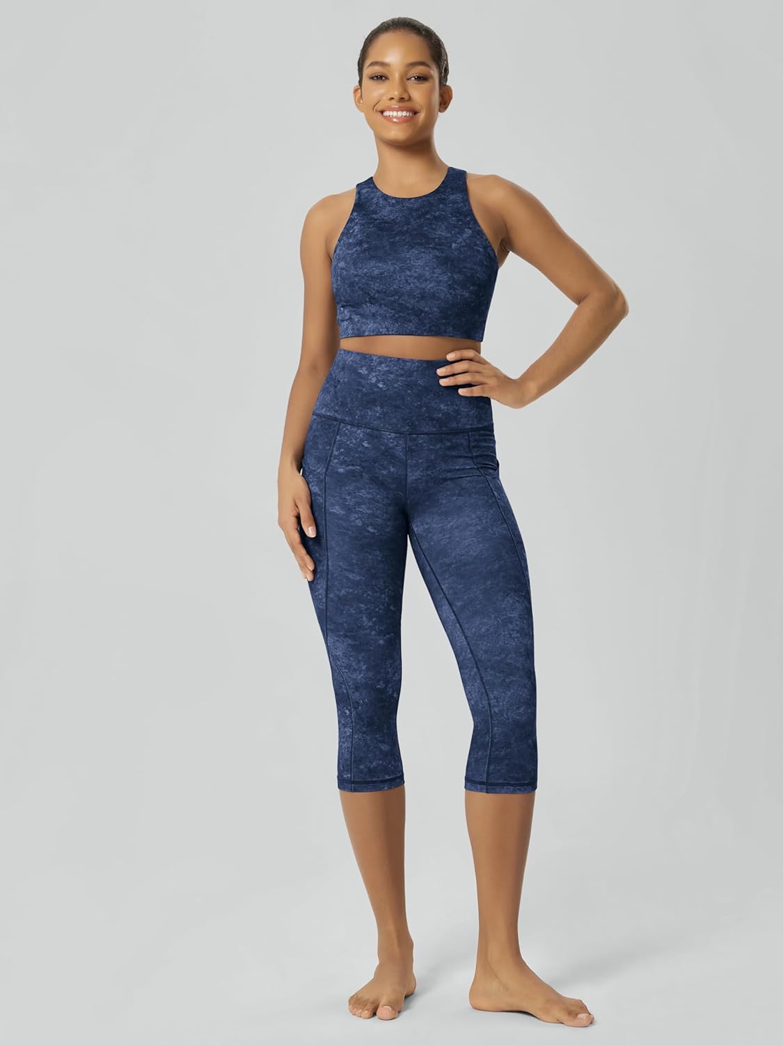 ODODOS Women's High Waisted Yoga Capris with Pockets, Tummy Control Non See Through Workout Athletic Running Capri Leggings