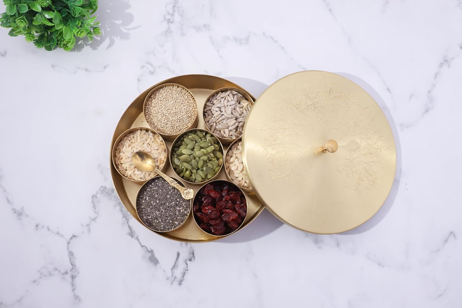Ajuny Handcrafted Brass Spice Box 8 Inch Golden with Embossed Lid - Decorative Round Masala Canister 7 Removable Spice Storage Containers and 1 Designer Spoon Ideal for Seasonings & Herbs