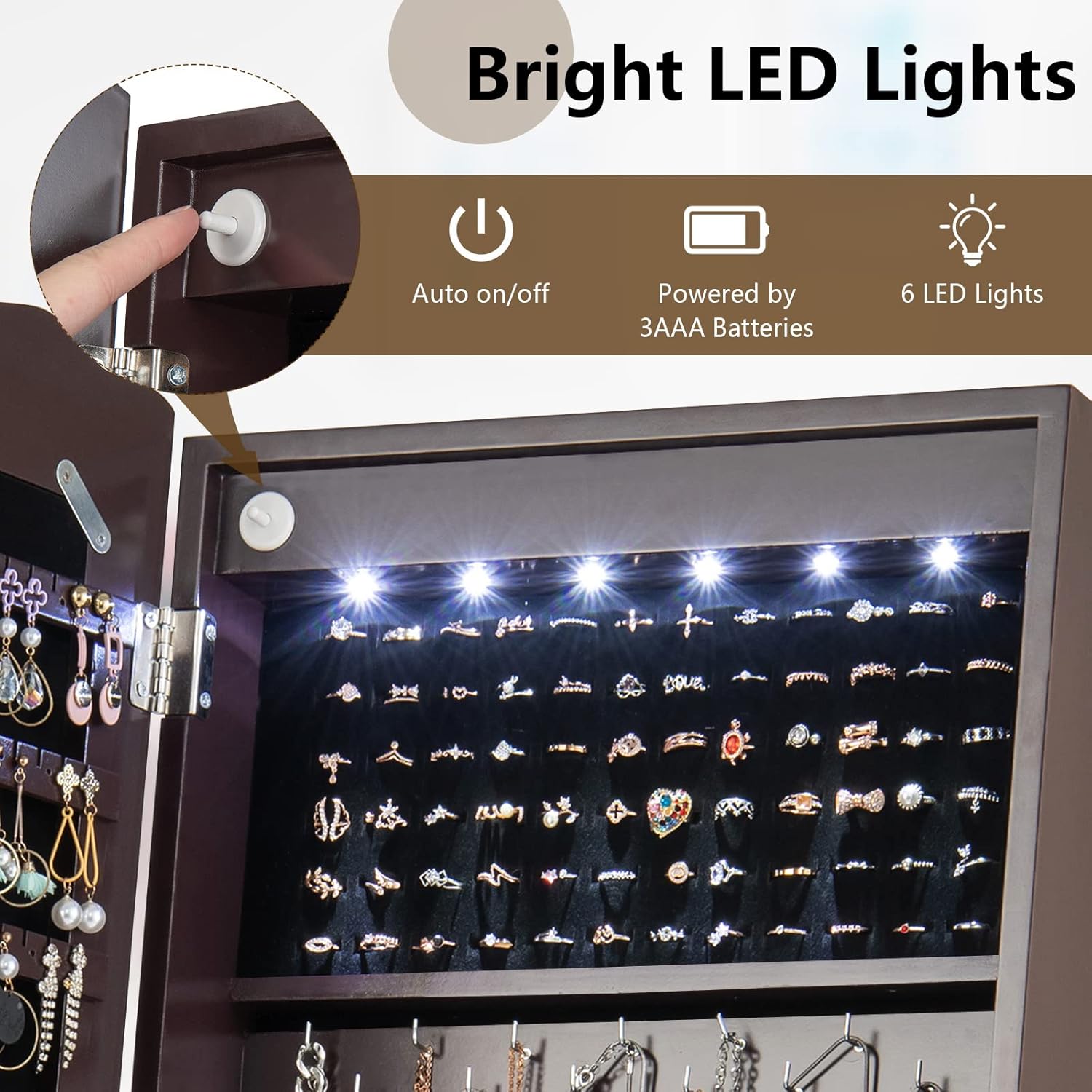 Close-up of the LED lights inside the jewelry armoire, showing the auto on/off sensor and battery compartment.