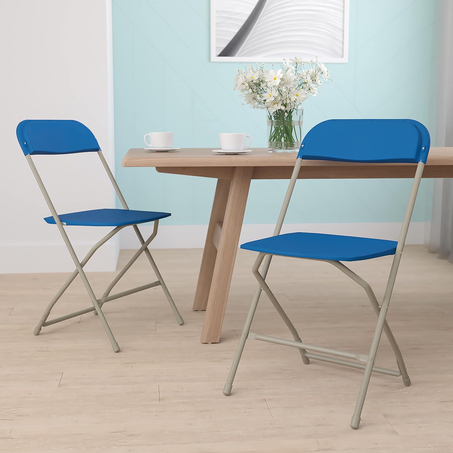 EMMA + OLIVER Set of 2 Plastic Folding Chairs - 650 LB Weight Capacity Lightweight Stackable Folding Chair in Blue