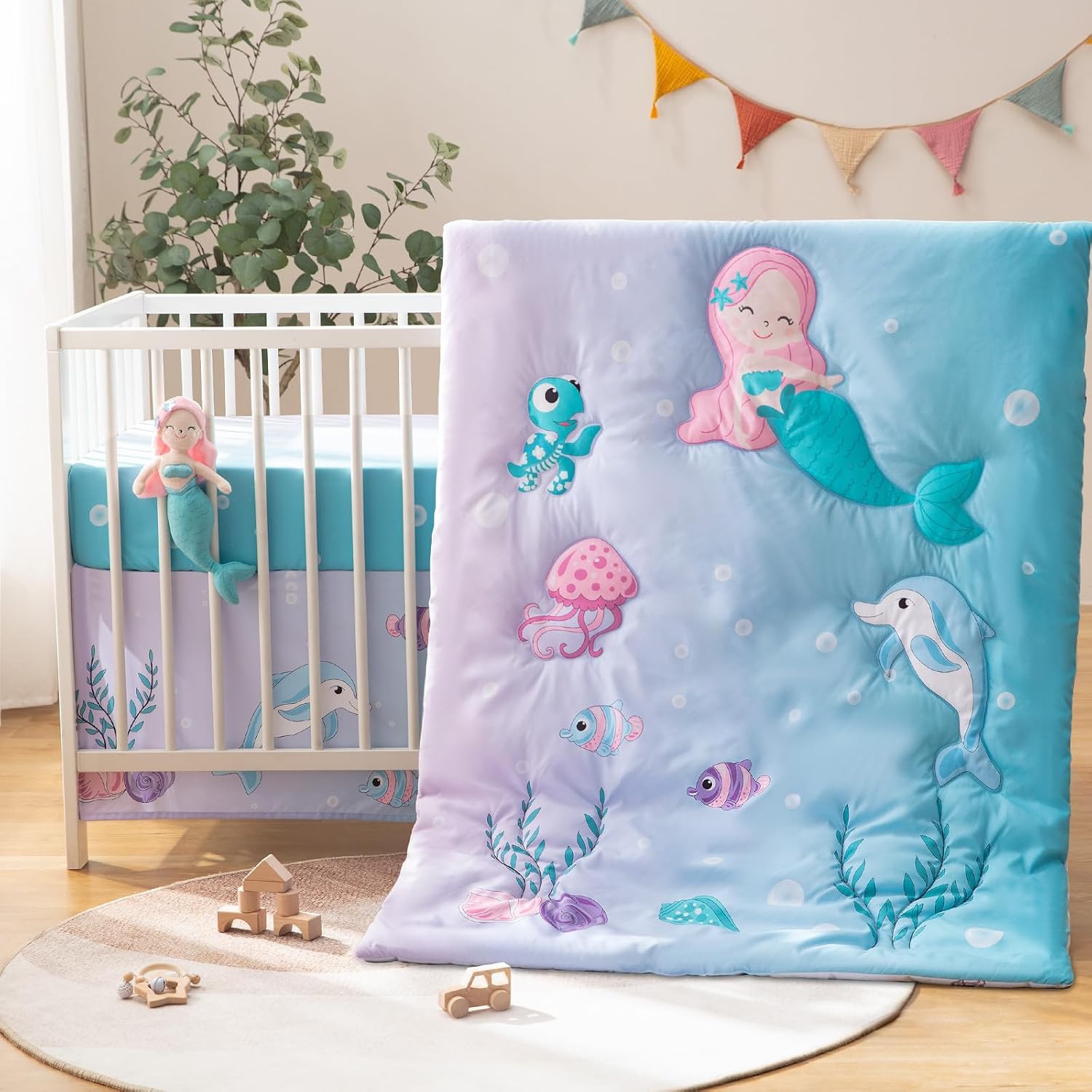 4 Pieces Crib Bedding Set for Baby Boys Girls, Infant Toddler Nursery Baby Bedding Sets Includes Cartoon Quilt, Fitted Crib Sheet, Crib Skirt and Plush Mermaid Toy