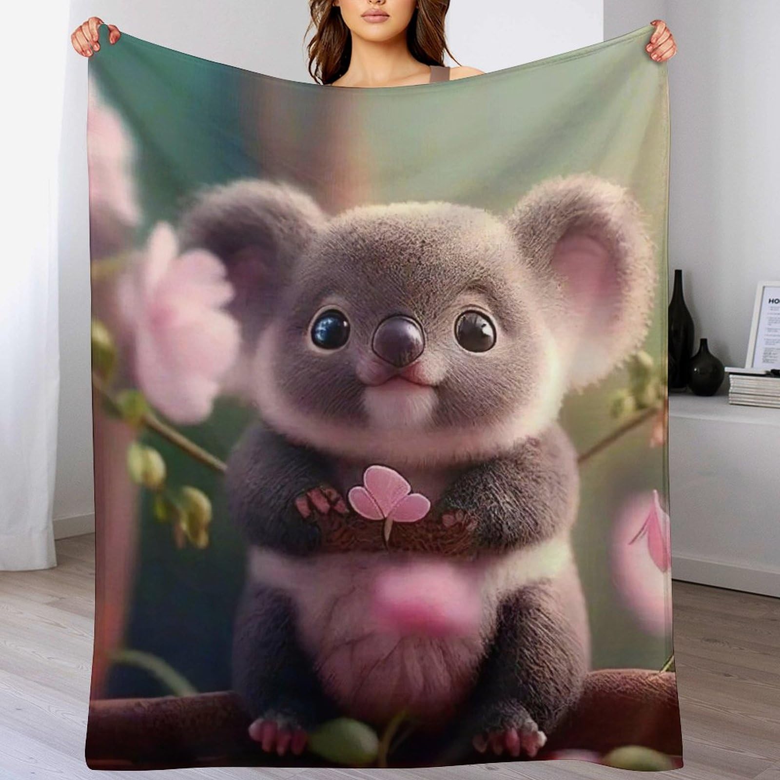 Couverture polaire koala chaude en flannel contre le froid sur votre lit