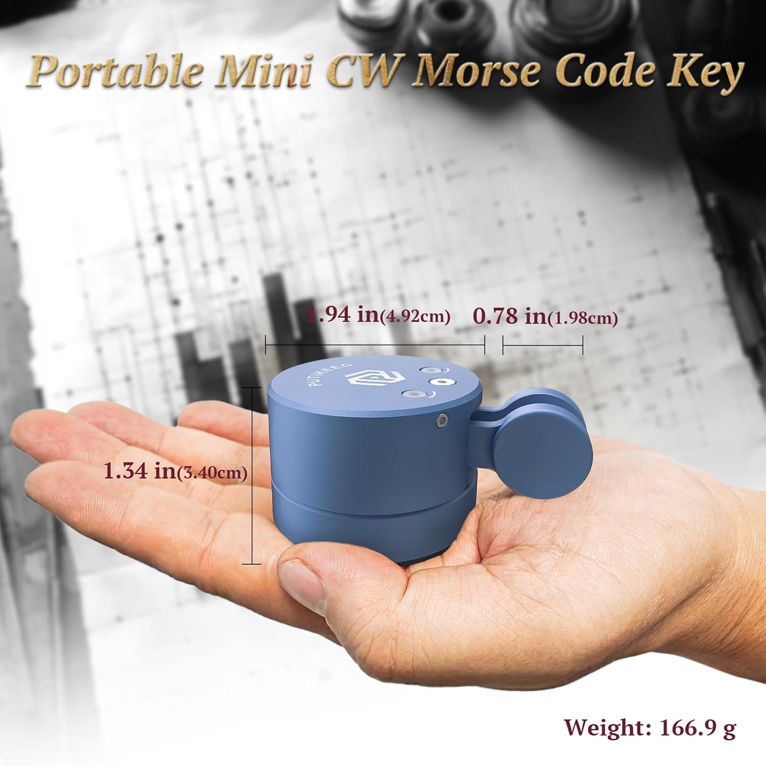 Putikeeg Mini Morse Code Key MCT03 held in a hand, showing its compact dimensions: 1.94 inches (4.92 cm) width, 0.78 inches (1.98 cm) paddle extension, and 1.34 inches (3.40 cm) height. The key weighs 166.9 grams.