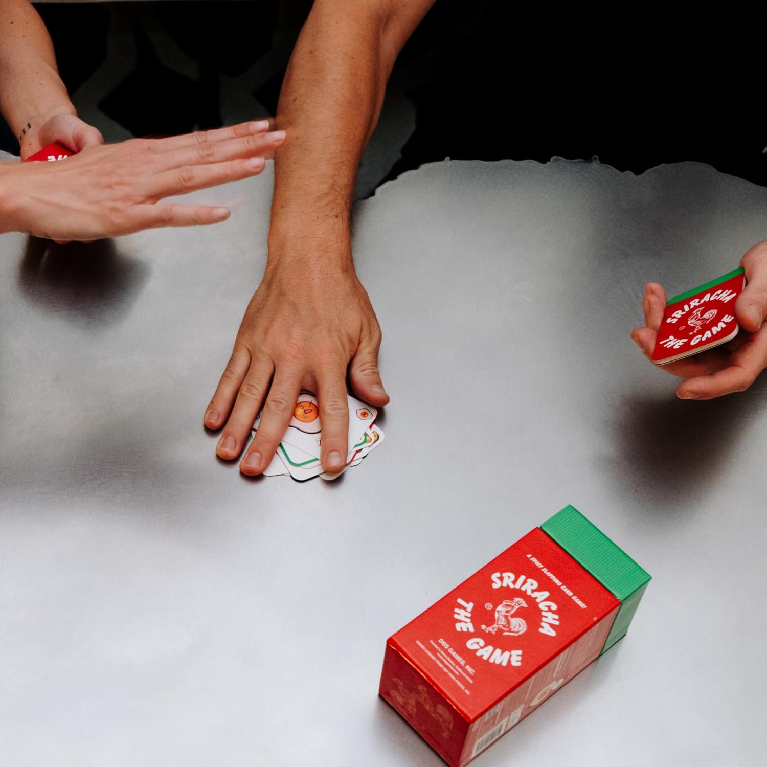 DSS Games Sriracha: The Game [A Spicy Slapping Card Game for The Whole Family | Great for White Elephant Gifts, Stocking Stuffers, Coworkers, Under $20, Ages 7 and Up]
