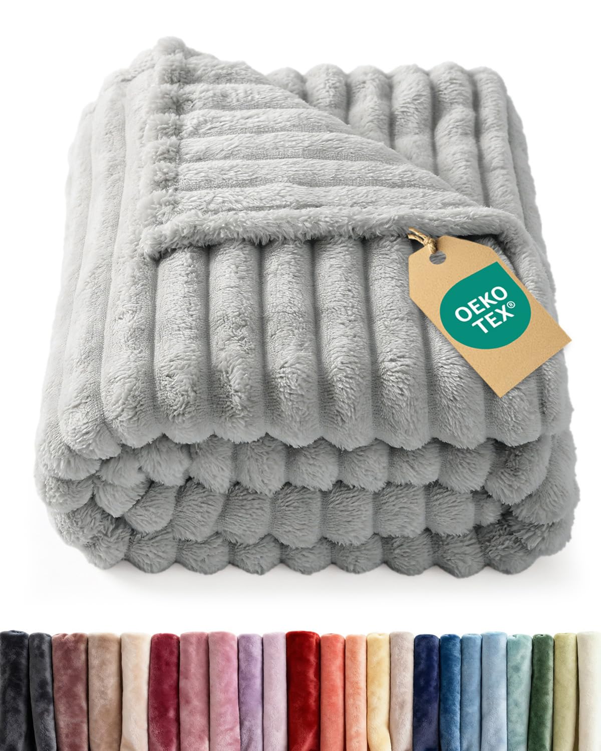 The CGK Unlimited Super Soft Fleece Blanket features a distinguished ribbed jacquard texture, adding visual depth and tactile comfort.