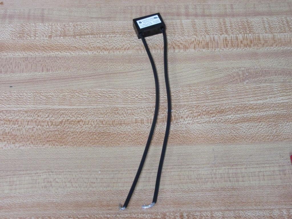 Full view of the YORK 031-00808-000 Surge Suppressor with wires