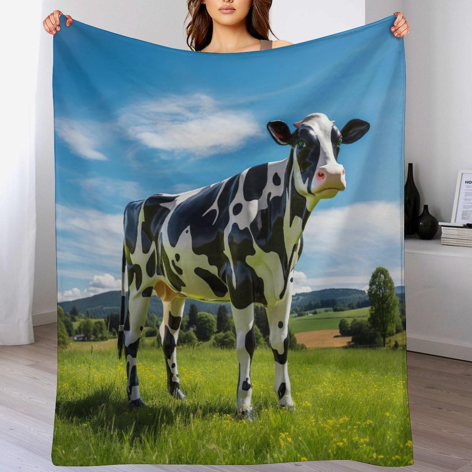 Couverture polaire vache 140x180 pour des soirées cocooning et douillettes sur votre canapé