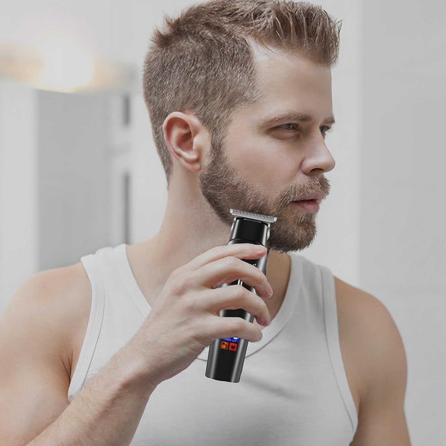 KEMEI KM-1113 Trimmer in use for hair cutting