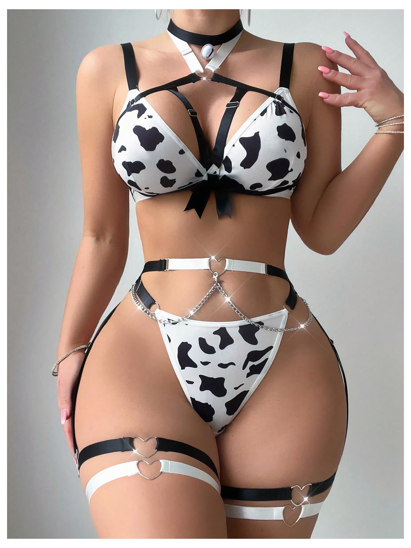 WDIRARA Women's 9 Piece Cow Print Hollow Out Strappy Lingerie Set with Garter Belt: Medium Black and White