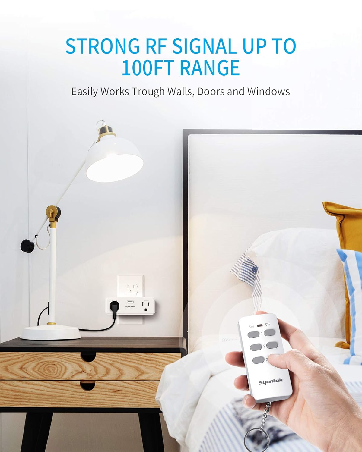 Person using Syantek remote control to operate an outlet plugged into a wall behind a bed, demonstrating the 100ft RF signal range.
