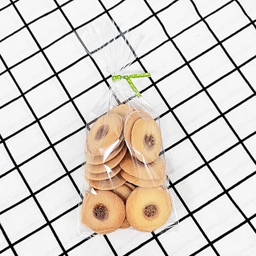 Vista 20 de Newkita Bolsas de golosinas transparentes, bolsas para pasteles y dulces con lazos giratorios de 4 pulgadas, paquete de 100