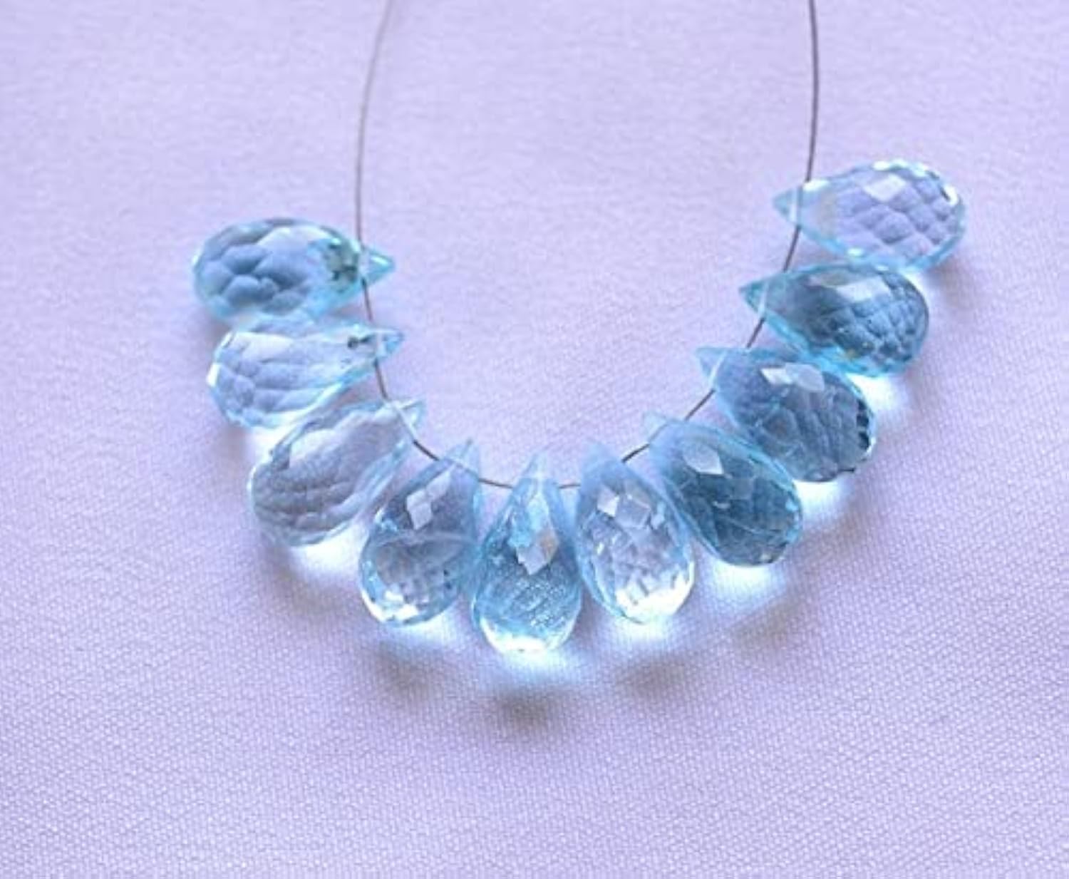 Perles briolettes Blue az facettées de haute précision pour joaillerie