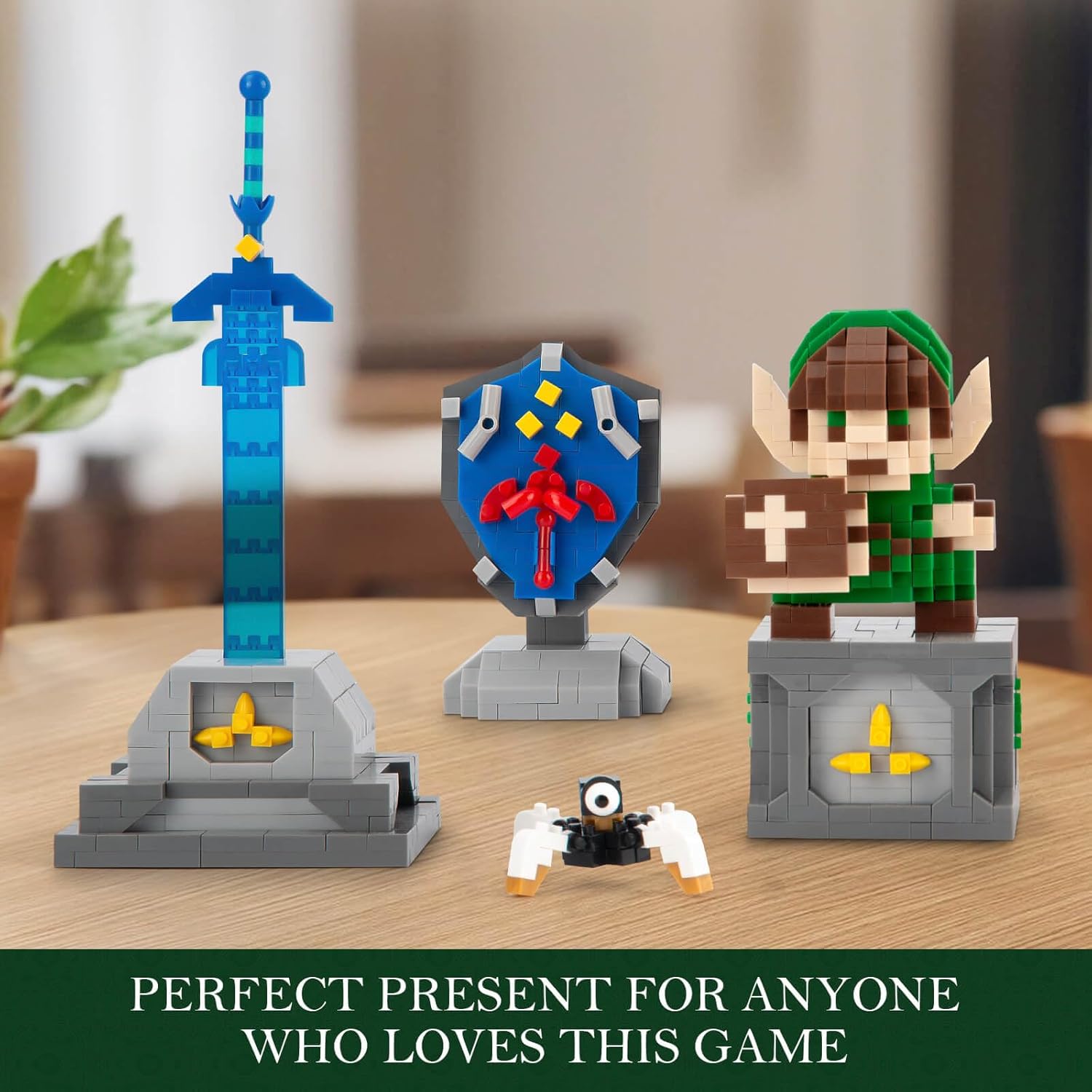 Completed Link, Master Sword, Hylian Shield, and mini-Guardian models displayed on a wooden surface