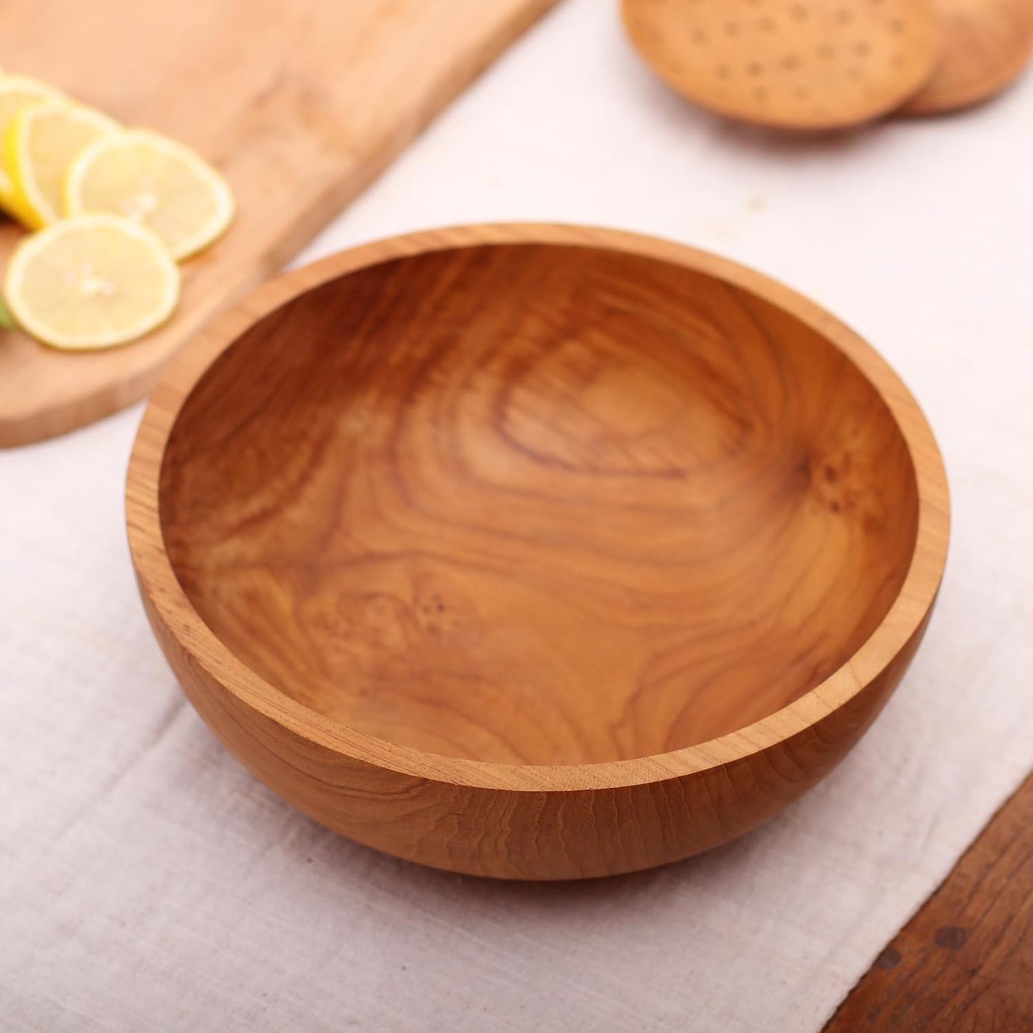 NOVICA Artisan Handcarved Teak Wood Serving Bowl from Bali Brown Indonesia Tableware Serveware Bowls Natural Materials [bowl 3.5in H x 9.75in Diam. 40 Oz.] ' Calm Lumber'