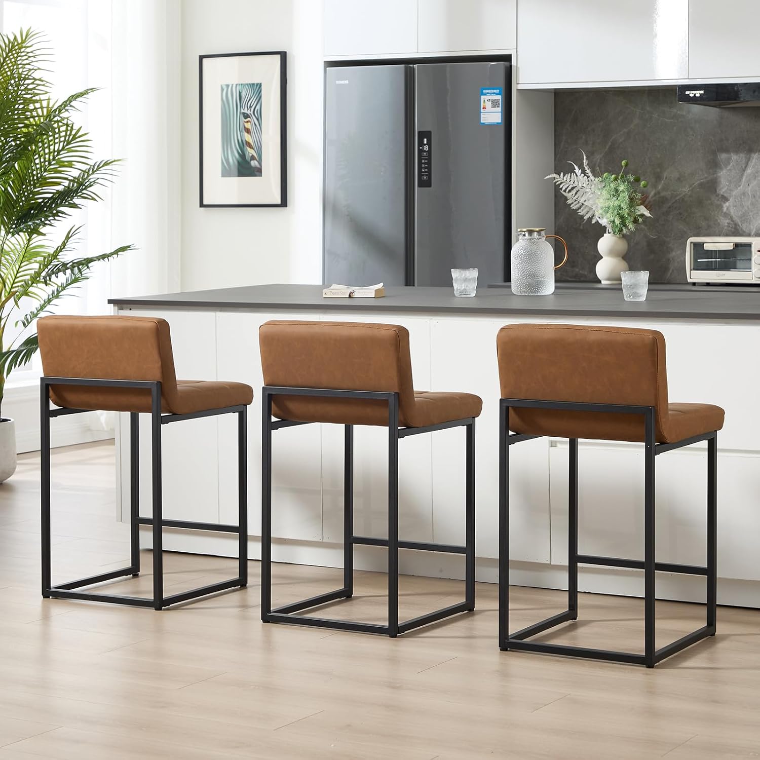 24 Inch Counter Height Bar Stools Set of 4, Modern Kitchen Barstools with Low Back and Black Sturdy Metal Legs, Faux Leather Upholstered Bar Chairs for Kitchen Island, Brown