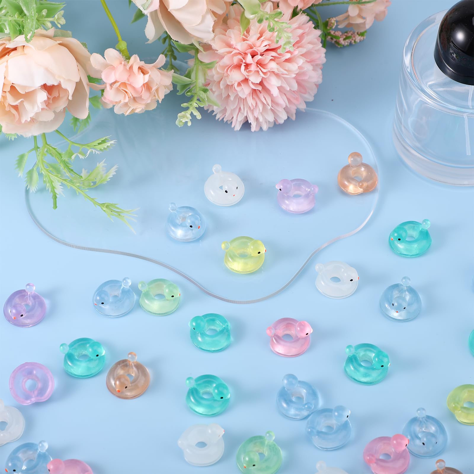 Lyreh 50pcs Mini Luminous Swimming Ring Ducks, 7 Color Tiny Small Resin Glow in the Dark Duck Miniature Garden Decor for DIY Dollhouse Bonsai Terrarium Micro Landscape Decors - Image 3